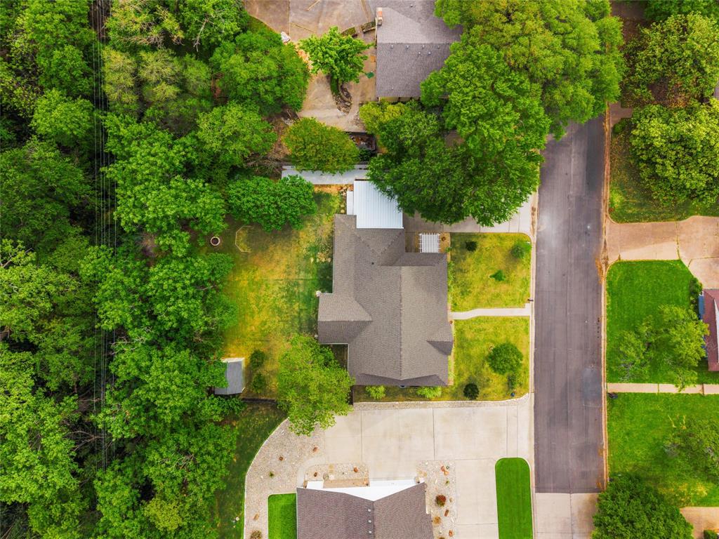 8224 Forest Ridge Drive Woodway, TX 76712 - Photo 36 of 38 an aerial view of a house with a garden