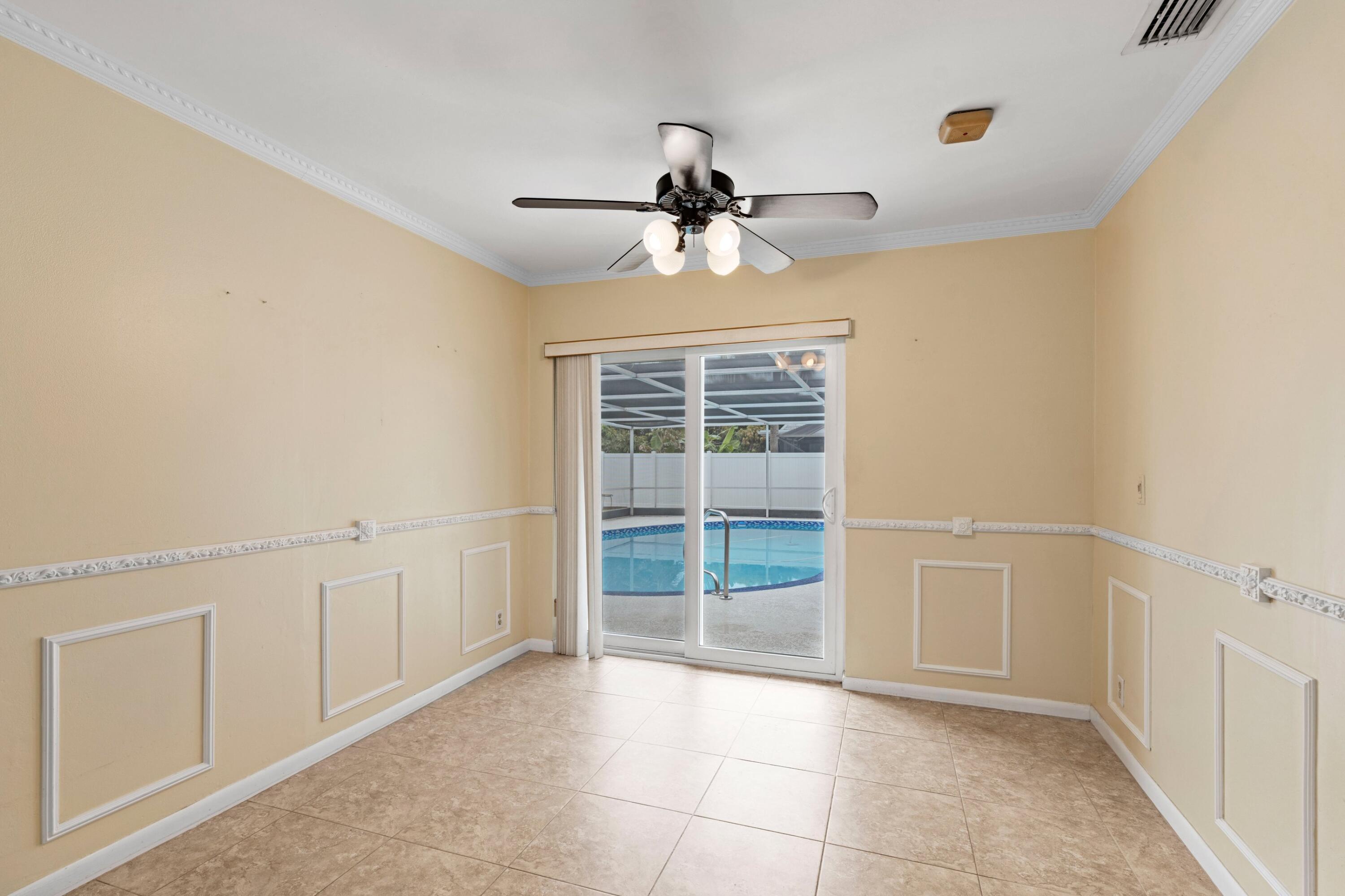 1640 Northwest 10th Street Boca Raton, FL 33486 - Photo 11 of 40 a view of an empty room with a window