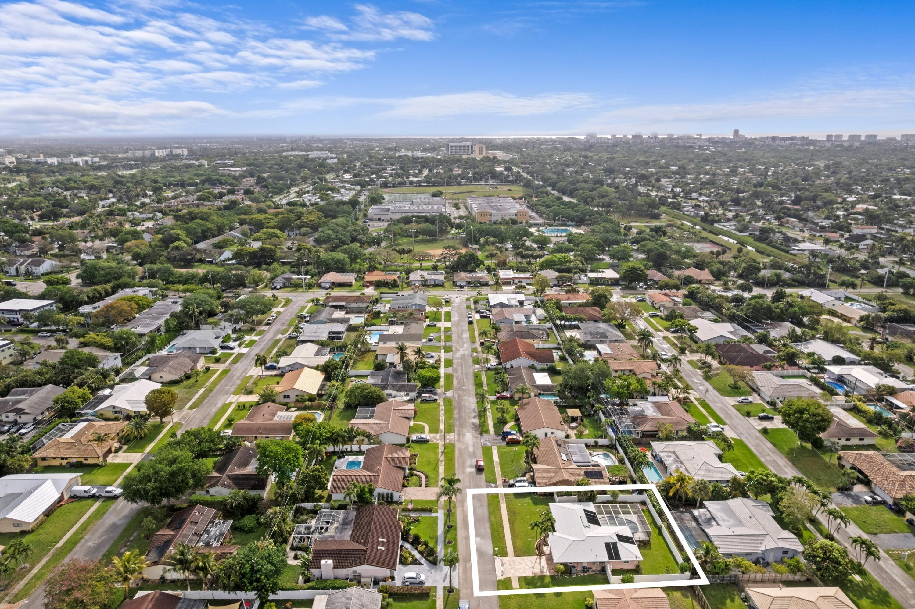 1640 Northwest 10th Street Boca Raton, FL 33486 - Photo 26 of 40 an aerial view of residential houses with city view