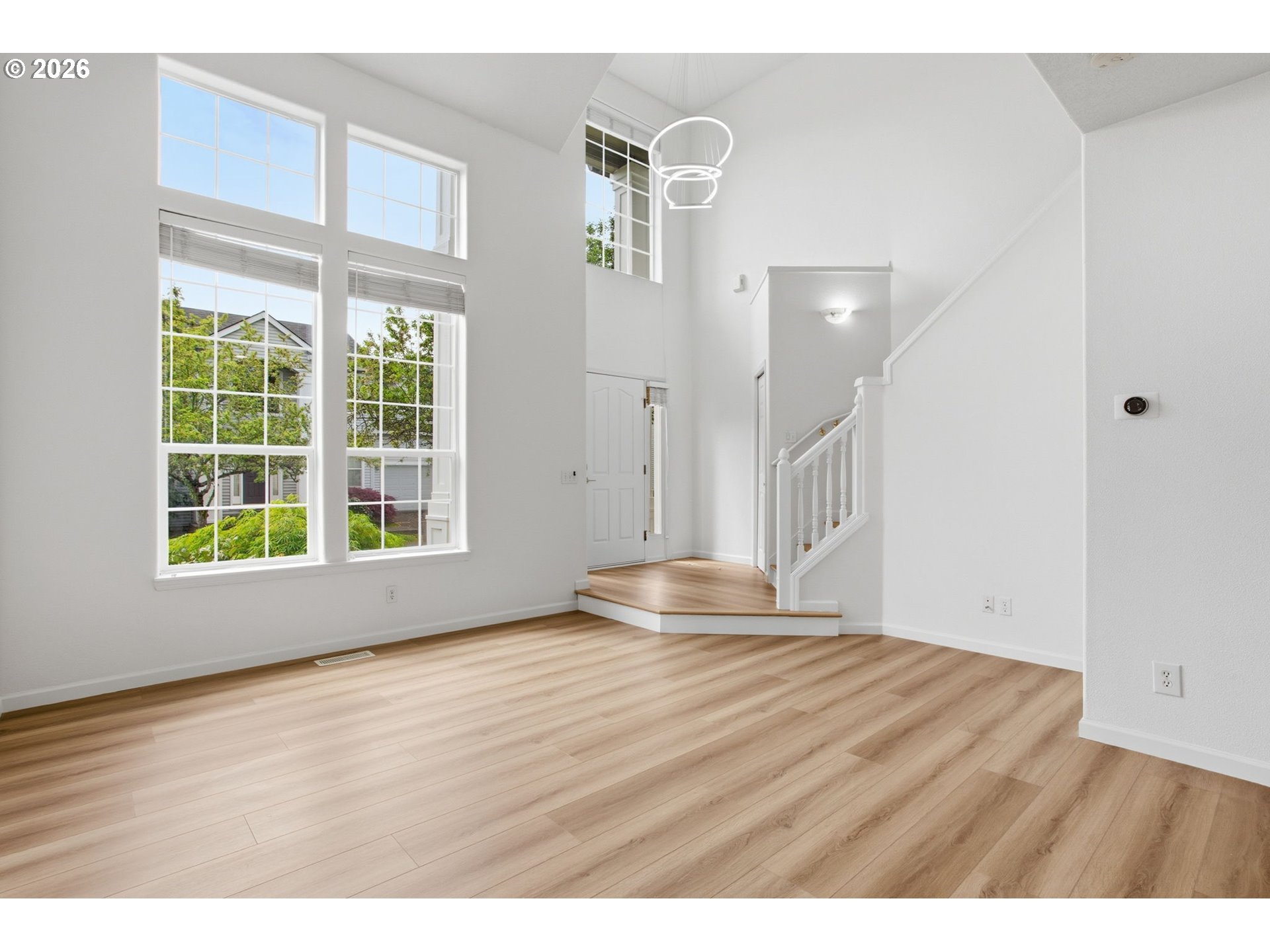 8911 Southwest Gravenstein Lane Tigard, OR 97224 - Photo 11 of 33 a view of an empty room with a window