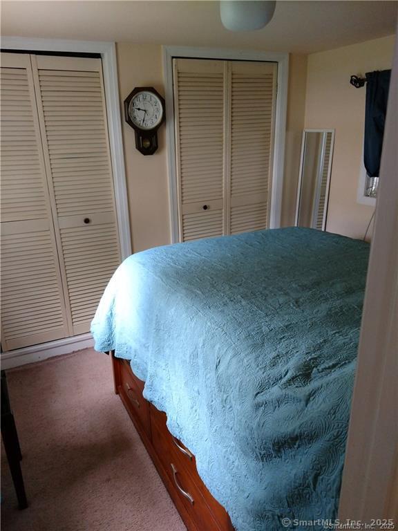 146 Pocono Point Road Danbury, CT 06811 - Photo 8 of 10 a bedroom with a bed and a shower