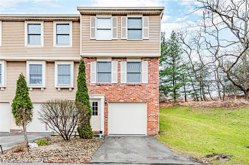 314 Quail Run Road Venetia, PA 15367 - Photo 1 of 24 a front view of a house with garden