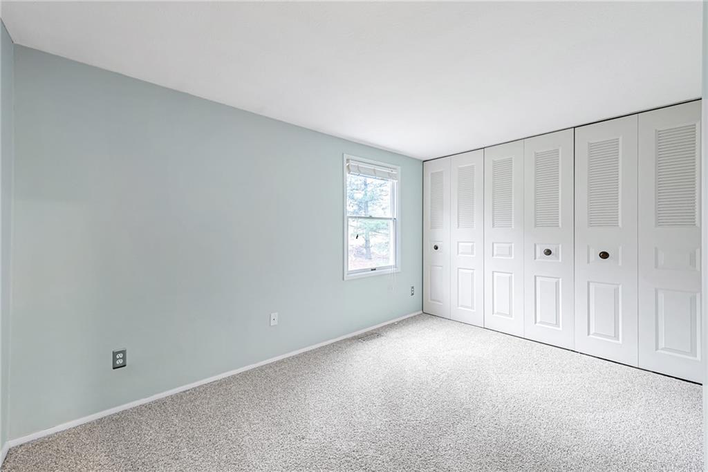 314 Quail Run Road Venetia, PA 15367 - Photo 14 of 24 a view of an empty room with a window