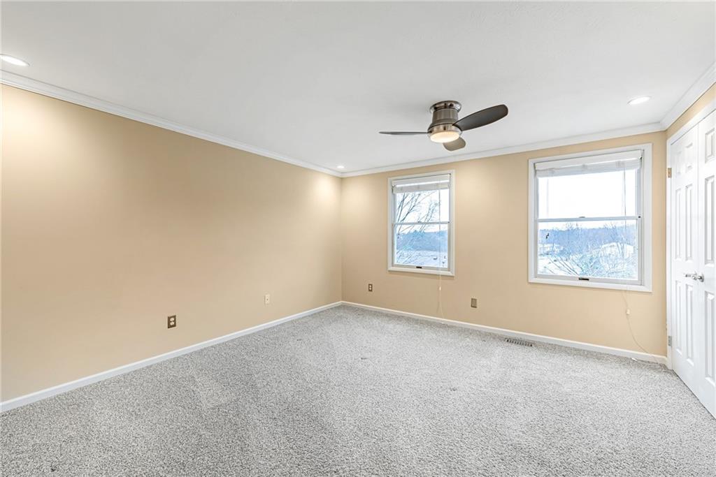 314 Quail Run Road Venetia, PA 15367 - Photo 17 of 24 a view of an empty room with a window