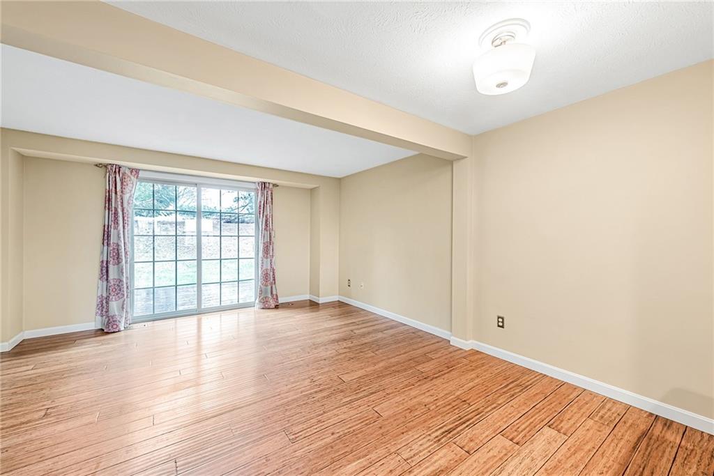 314 Quail Run Road Venetia, PA 15367 - Photo 6 of 24 wooden floor in an empty room with a window
