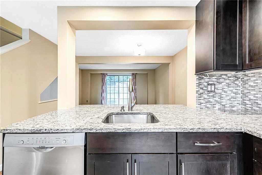 314 Quail Run Road Venetia, PA 15367 - Photo 8 of 24 a bathroom with a granite countertop sink and a mirror