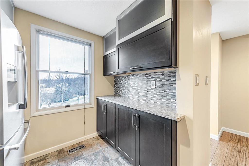 314 Quail Run Road Venetia, PA 15367 - Photo 10 of 24 a kitchen with a sink and a microwave