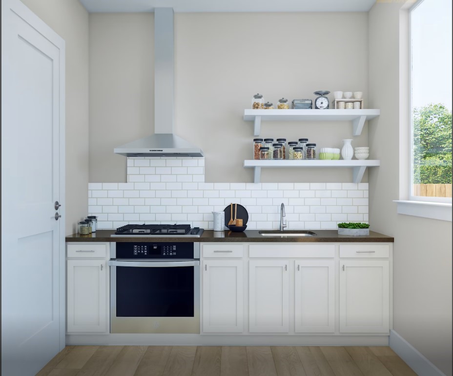 11931 Golden Cove Rosharon, TX 77583 - Photo 5 of 12 a kitchen with granite countertop a sink stove and cabinets