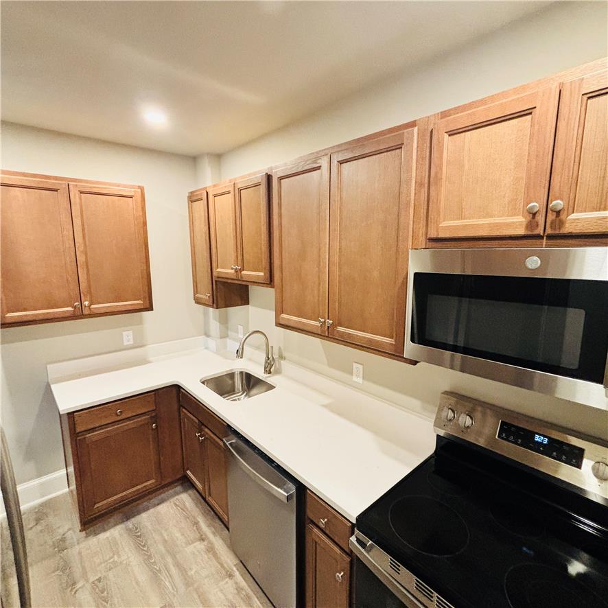 718 Linden Street Bethlehem, PA 18018 - Photo 7 of 19 A well-appointed cooking space offers abundant storage and modern conveniences.