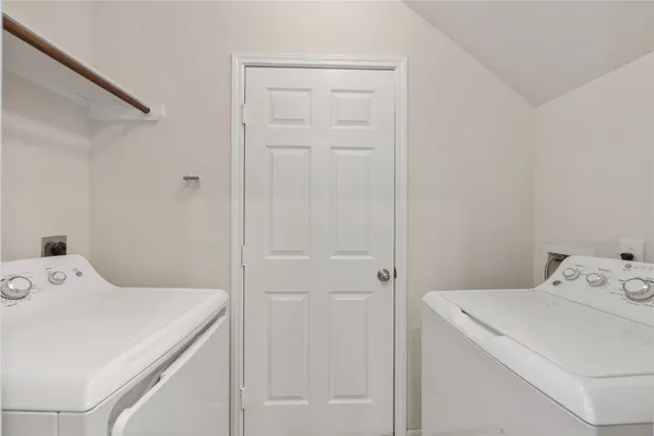 wooden floor in an empty room with a ceiling fan