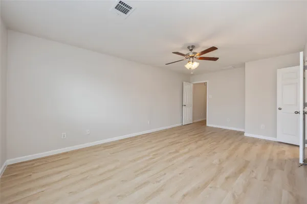 a bathroom with a sink double vanity and a mirror