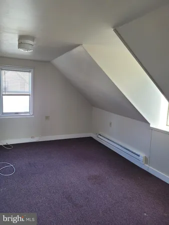 a view of a room with an empty space