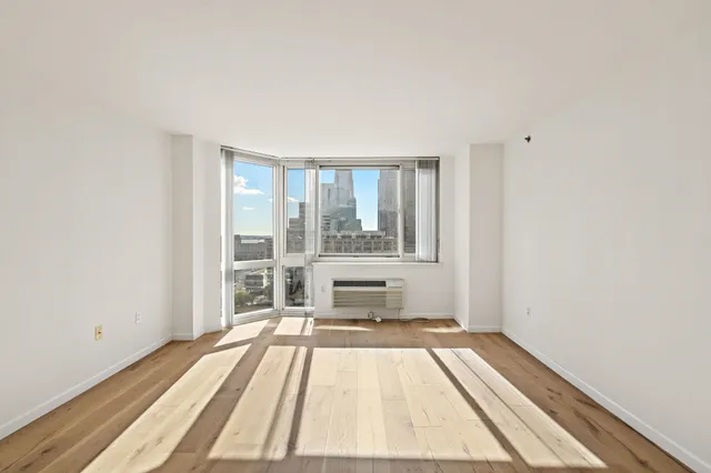 a view of a living room with a large window
