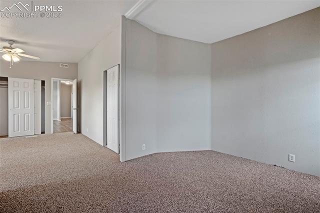 20150 Enoch Road Colorado Springs, CO 80928 - Photo 28 of 50 Spare room with carpet and ceiling fan