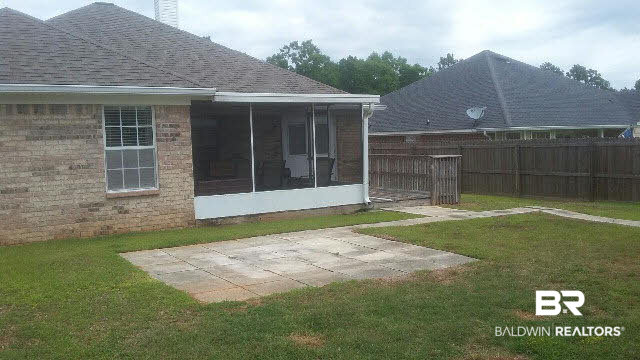 8451 Kendall Court Mobile, AL 36695 - Photo 27 of 33 Nice size screen porch with open deck for grill.