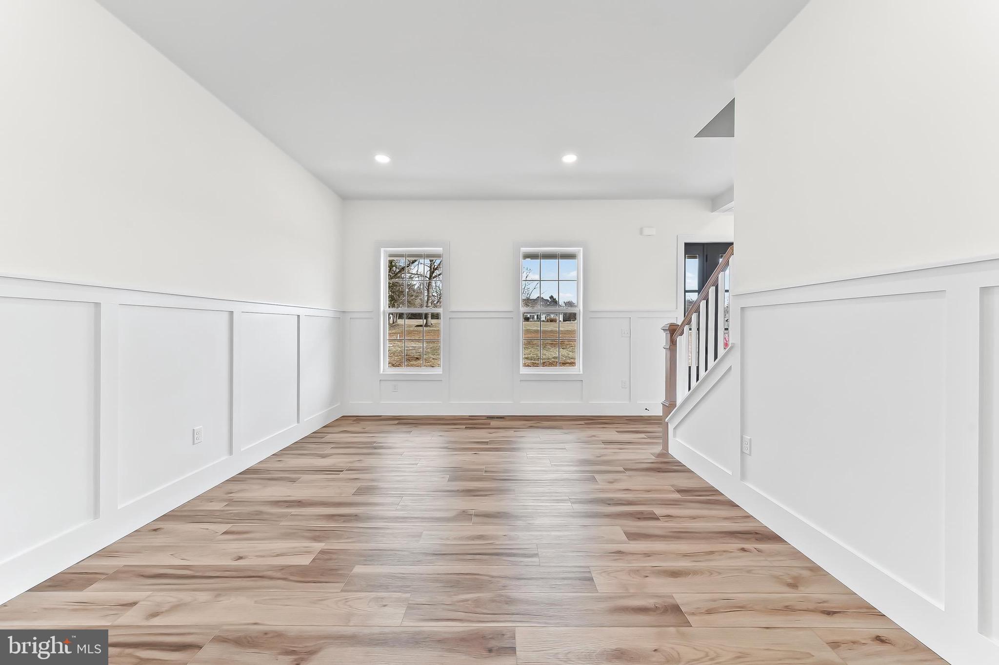 179 Ellicott Road Avondale, PA 19311 - Photo 27 of 65 a view of an empty room with wooden floor and a window