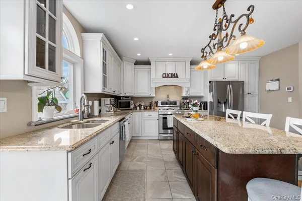 $1,399,999 | 174-28 Pidgeon Meadow Road | Flushing