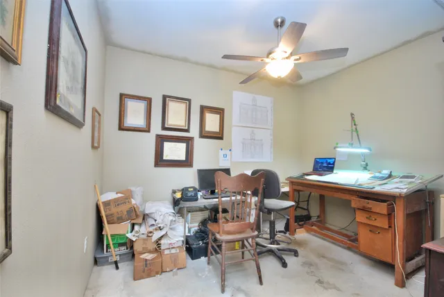 a view of room with furniture and wooden floor