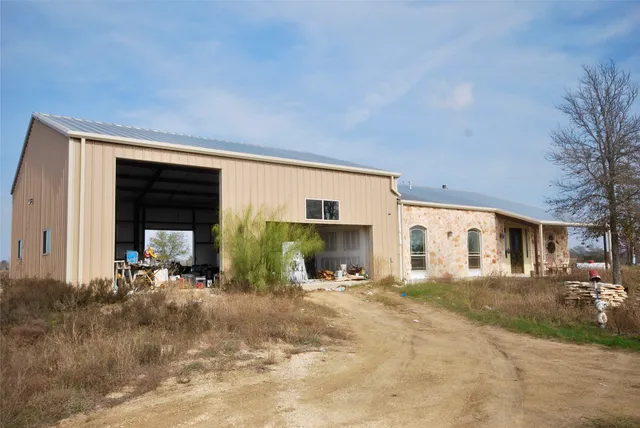 a view of a house with a patio