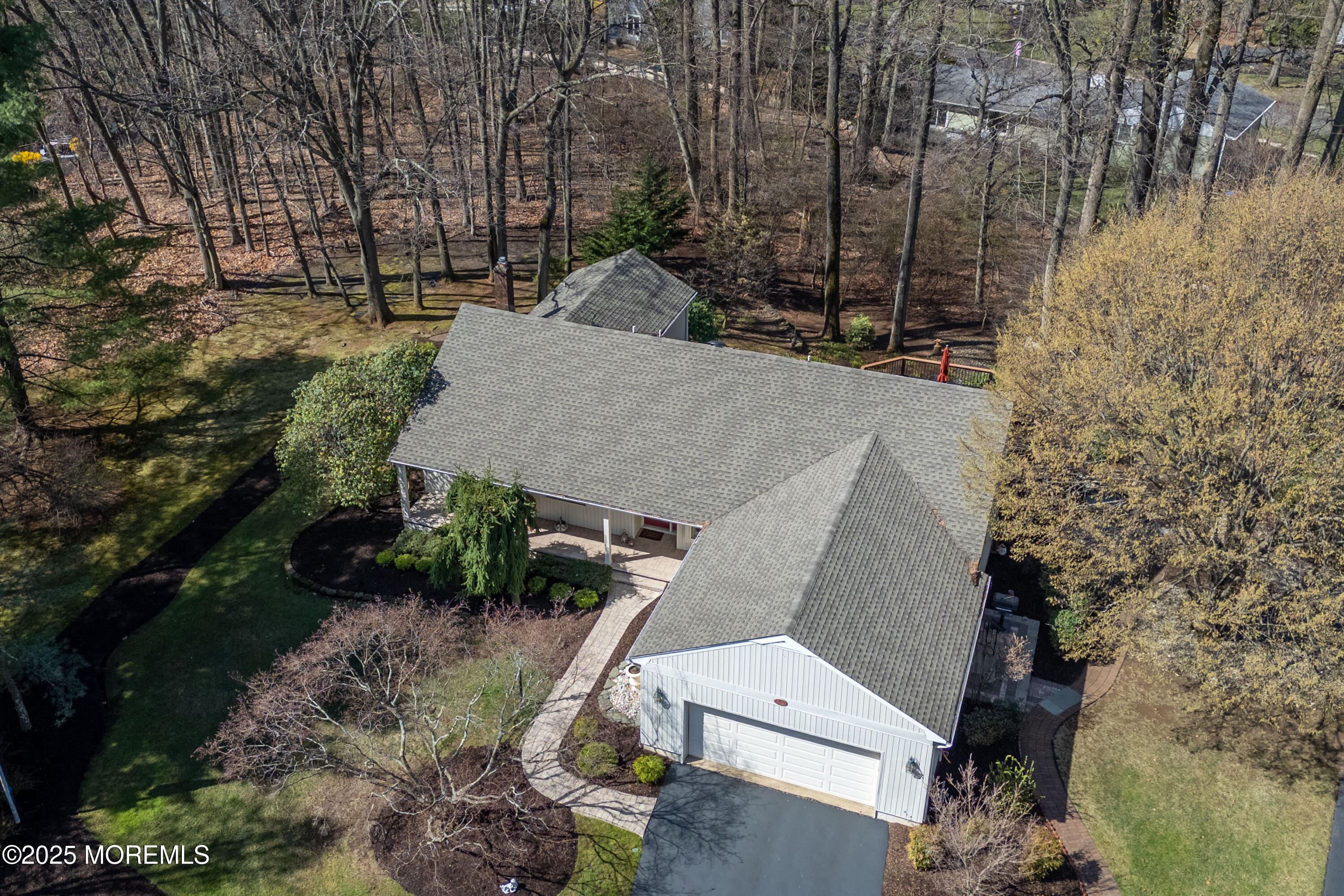 59 Doherty Drive Middletown, NJ 07748 - Photo 1 of 48 an aerial view of a house with a yard