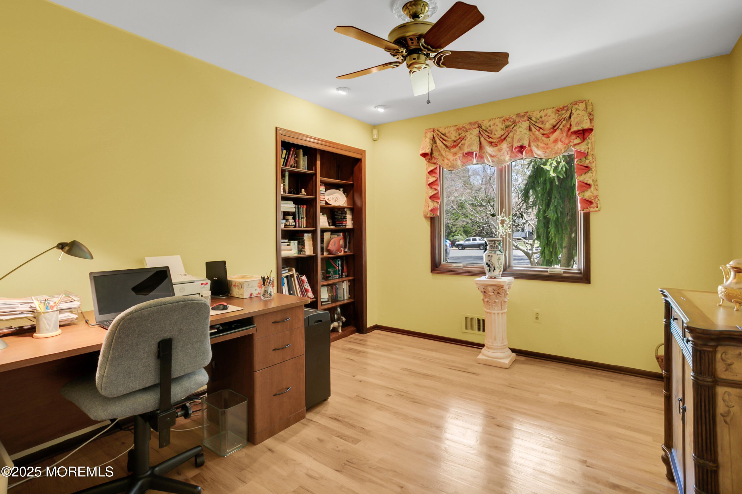 59 Doherty Drive Middletown, NJ 07748 - Photo 24 of 48 a view of a workspace with furniture and a window