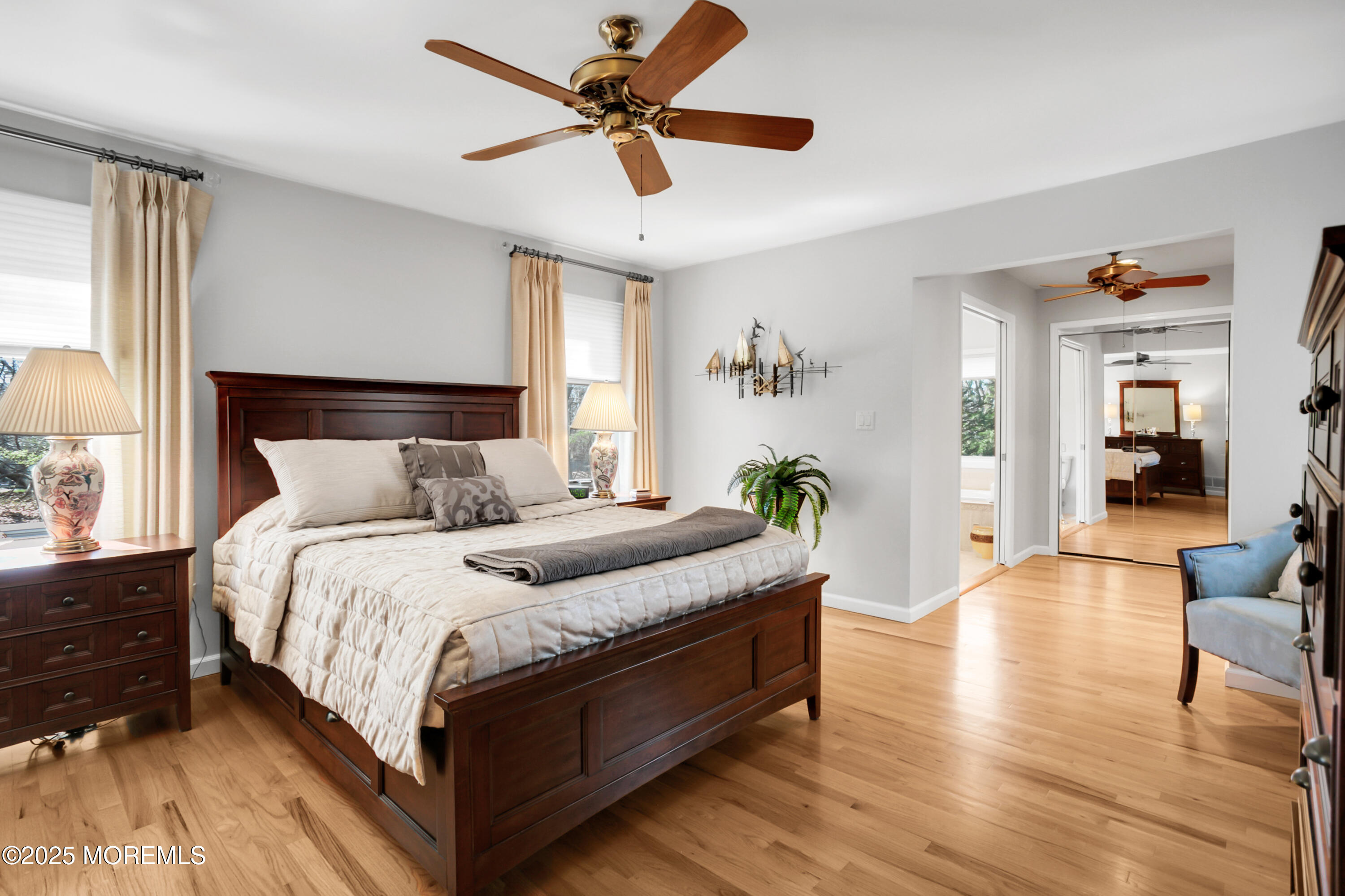 59 Doherty Drive Middletown, NJ 07748 - Photo 26 of 48 a spacious bedroom with a bed and wooden floor
