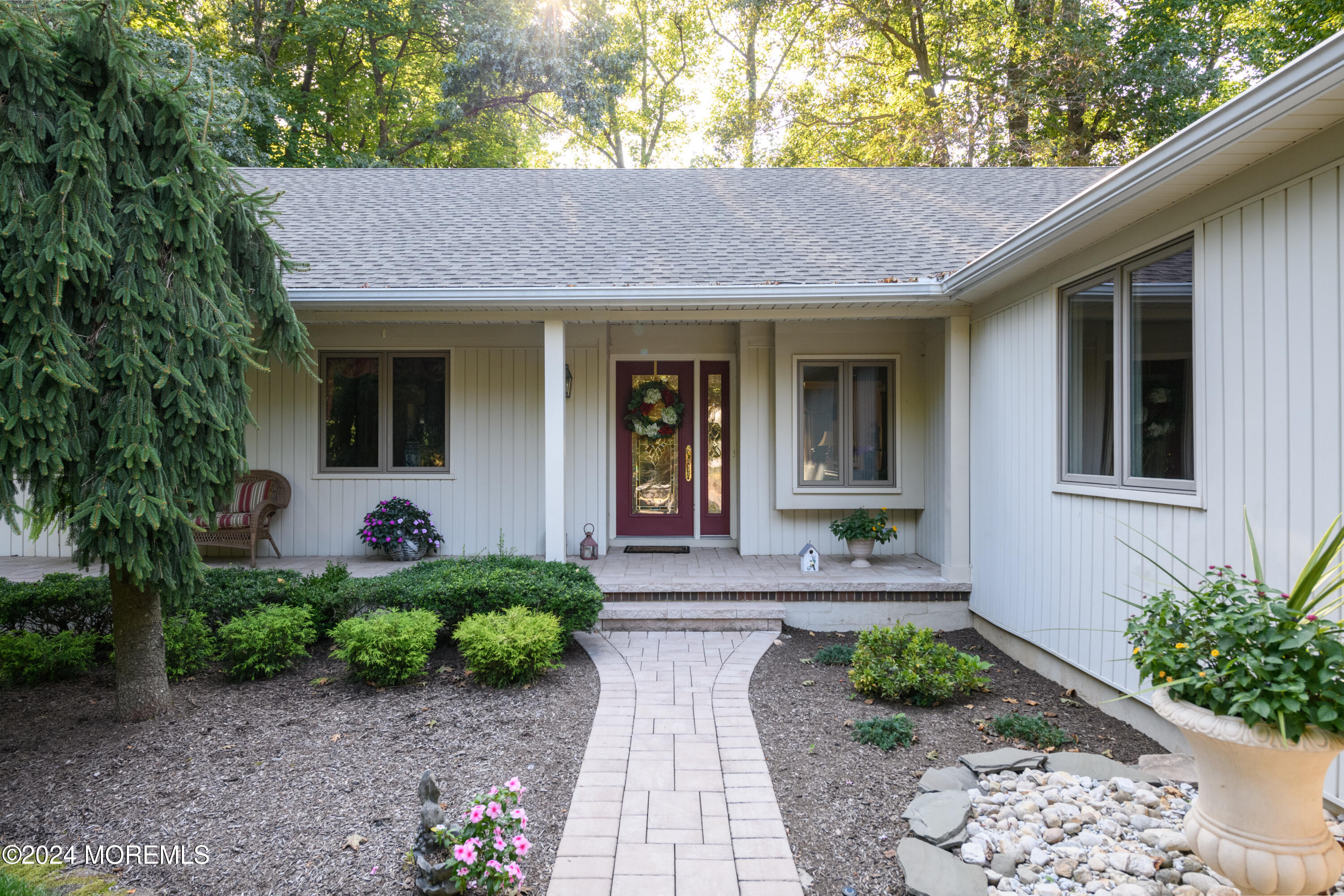 59 Doherty Drive Middletown, NJ 07748 - Photo 3 of 48 a front view of a house with garden