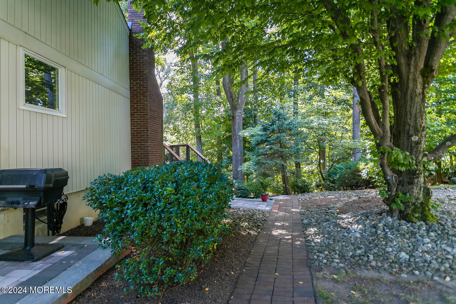 59 Doherty Drive Middletown, NJ 07748 - Photo 39 of 48 a backyard of a house with lots of green space