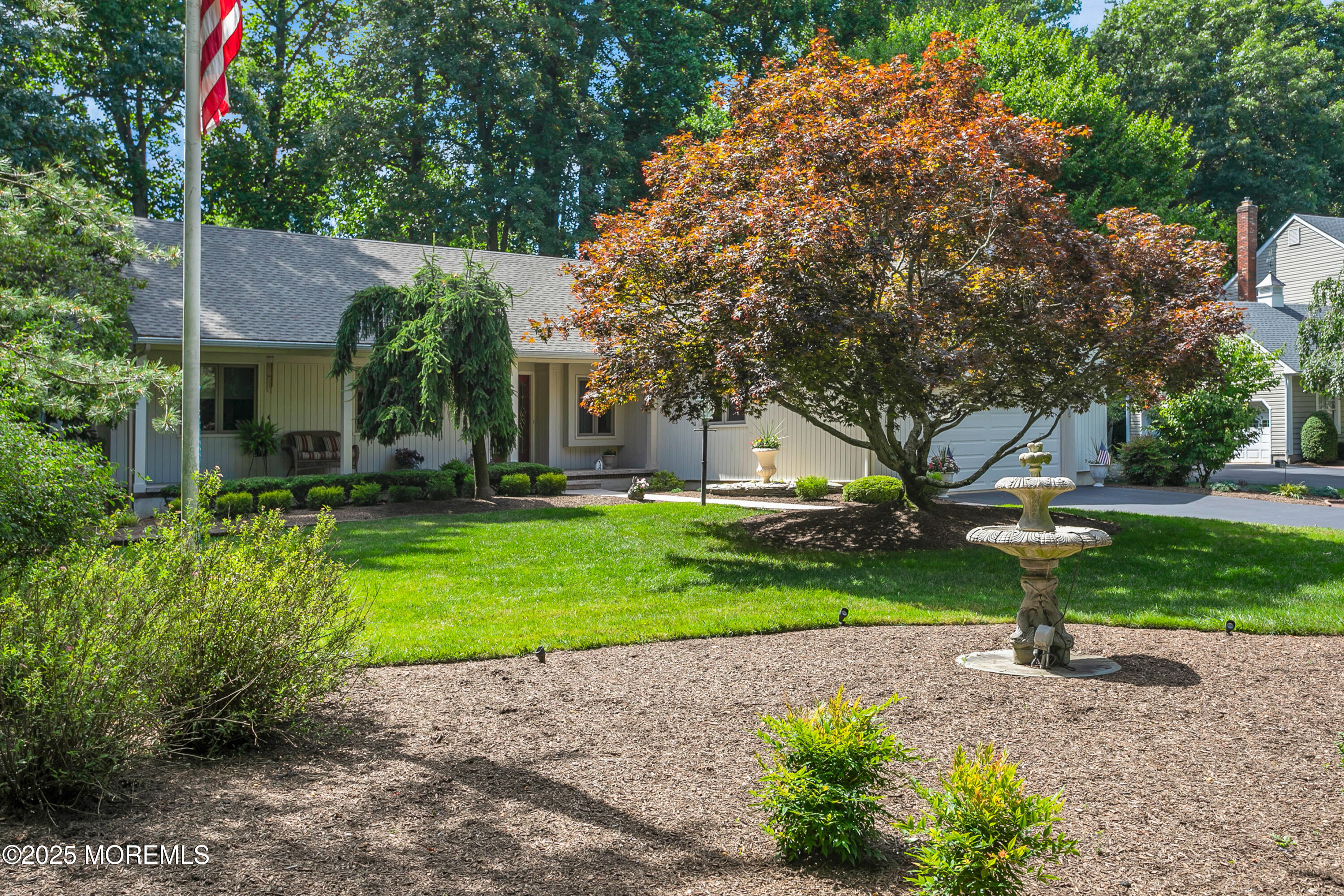 59 Doherty Drive Middletown, NJ 07748 - Photo 6 of 48 a view of a house with a yard and tree s