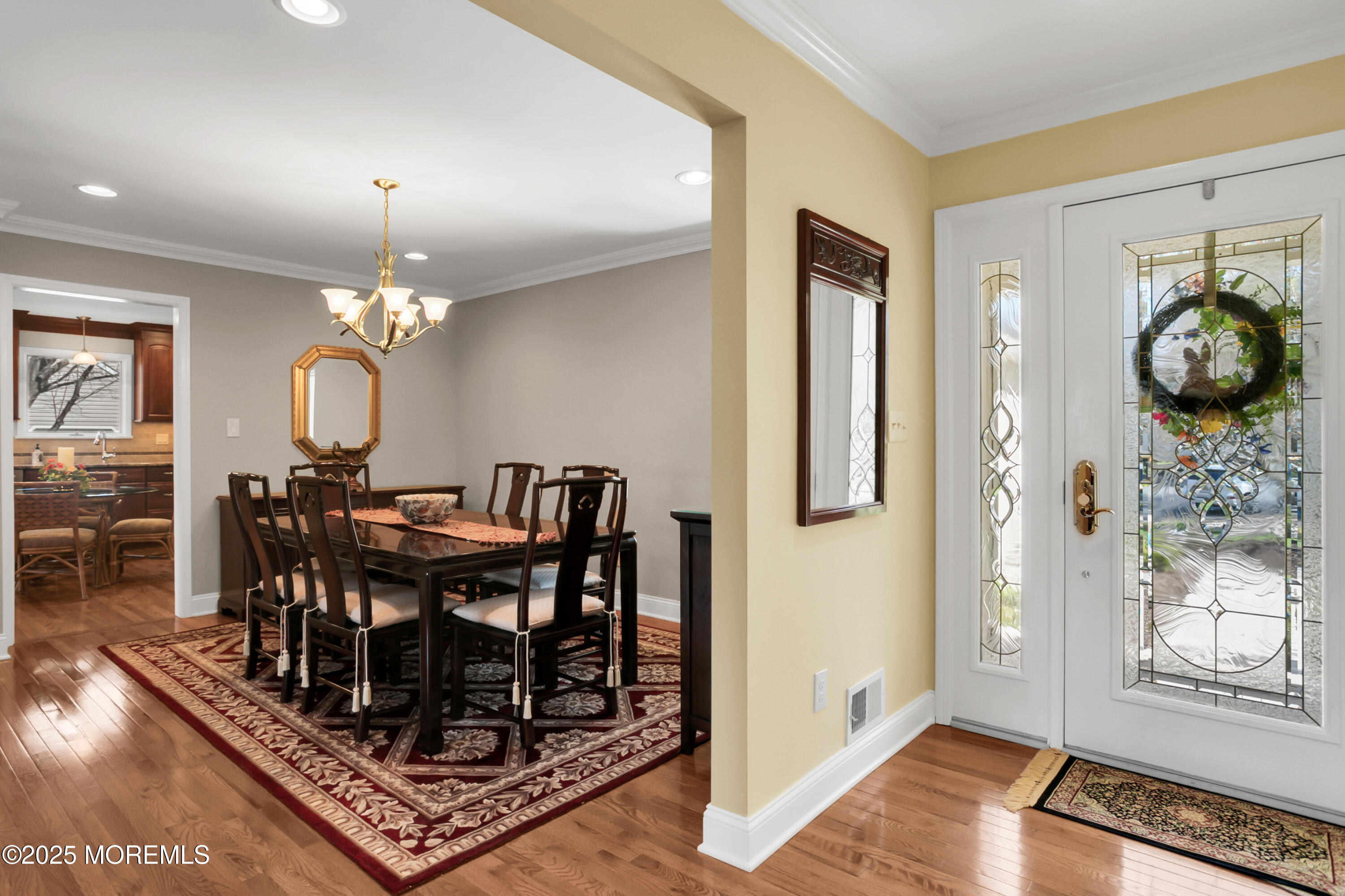 59 Doherty Drive Middletown, NJ 07748 - Photo 7 of 48 a view of a dining room with furniture and wooden floor