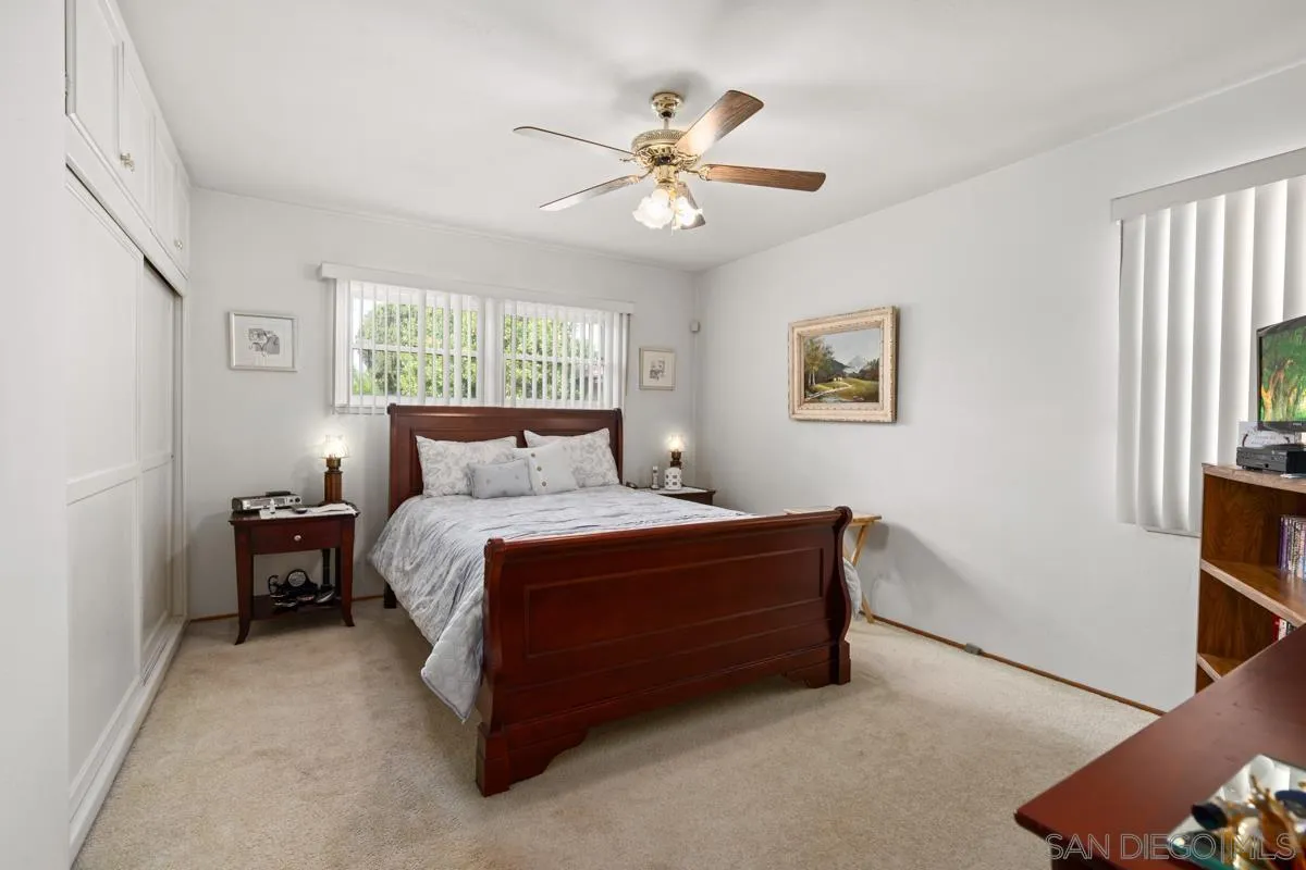 4871 Luther Street Riverside, CA 92504 - Photo 16 of 19 a bed room with a bed and a window