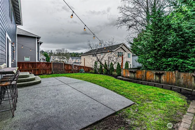 a view of backyard with green space