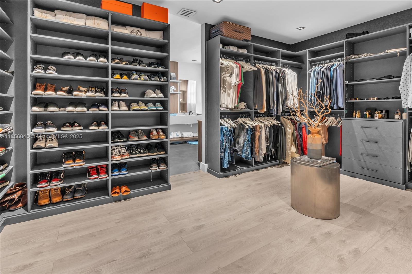 4335 Southwest 173rd Avenue Miramar, FL 33029 - Photo 16 of 59 a view of walk in closet with clothes and shoes