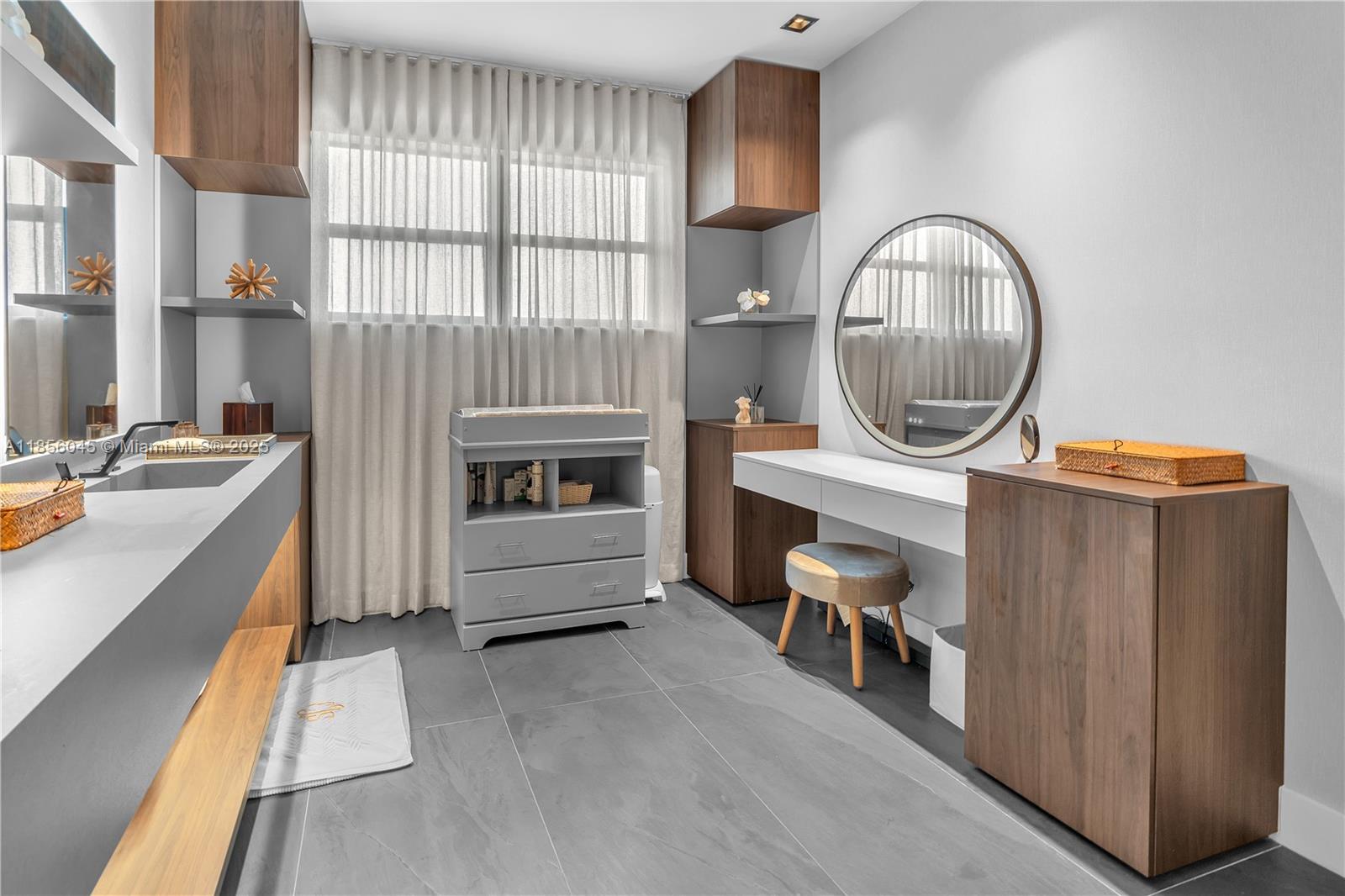 4335 Southwest 173rd Avenue Miramar, FL 33029 - Photo 18 of 59 a view of a workspace with furniture and a window