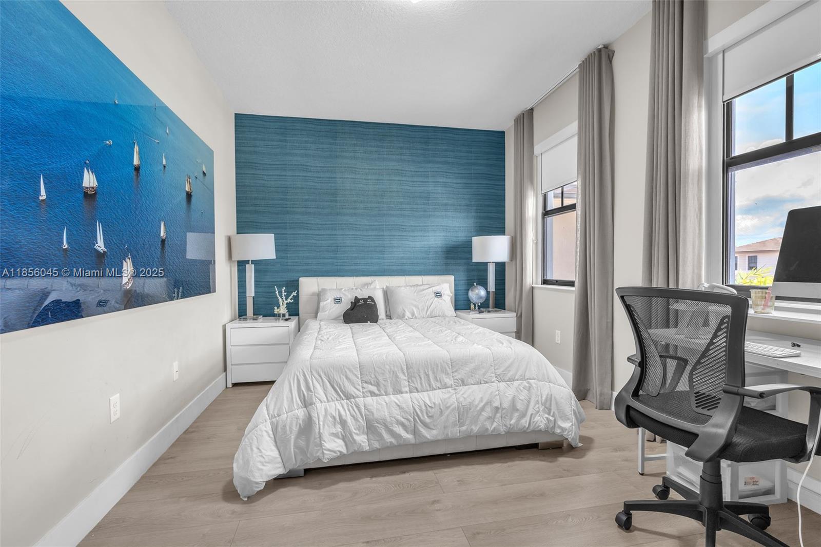 4335 Southwest 173rd Avenue Miramar, FL 33029 - Photo 24 of 59 a bedroom with a bed and a view of living room