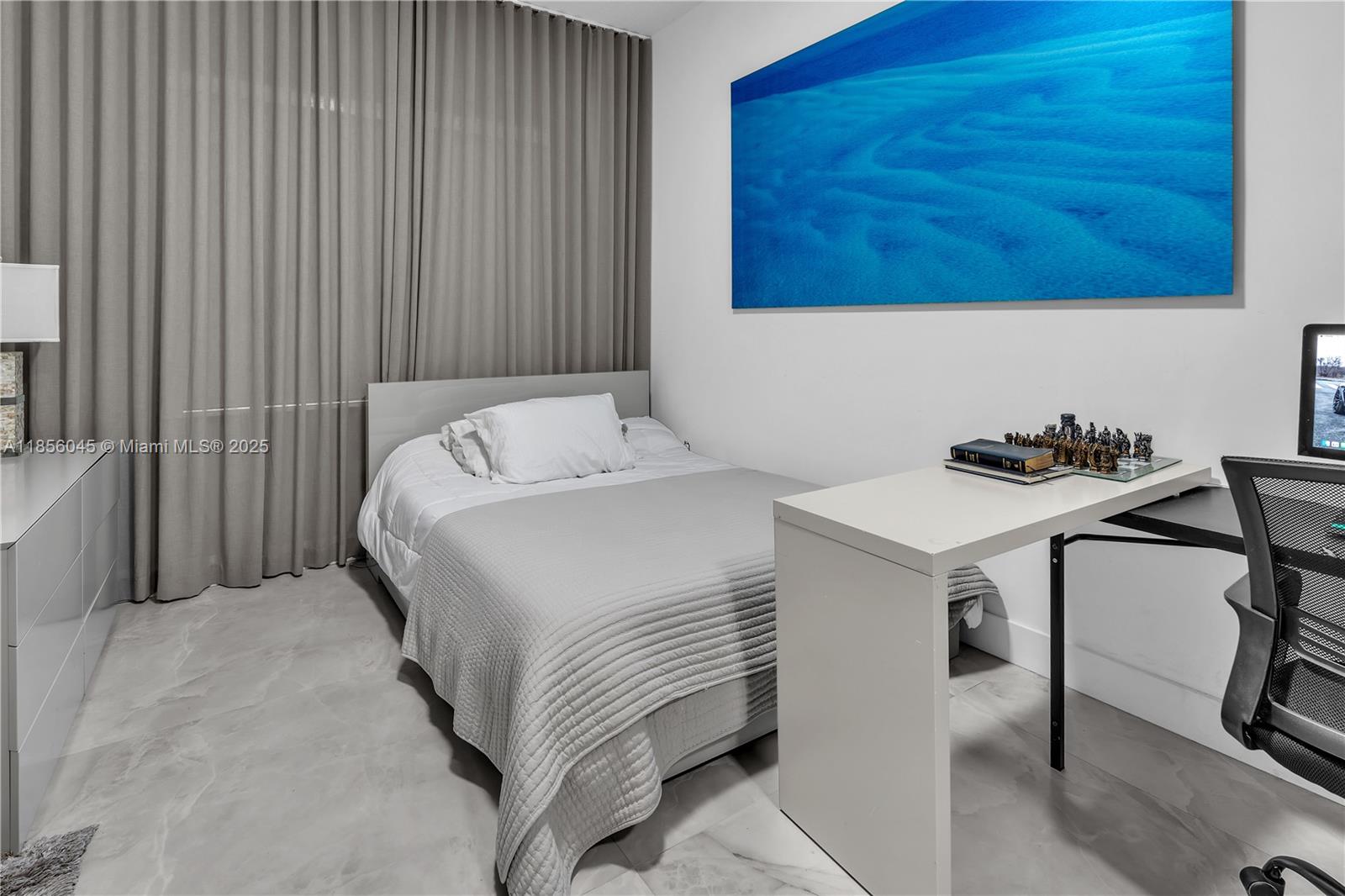 4335 Southwest 173rd Avenue Miramar, FL 33029 - Photo 32 of 59 a bedroom with a bed and a chair