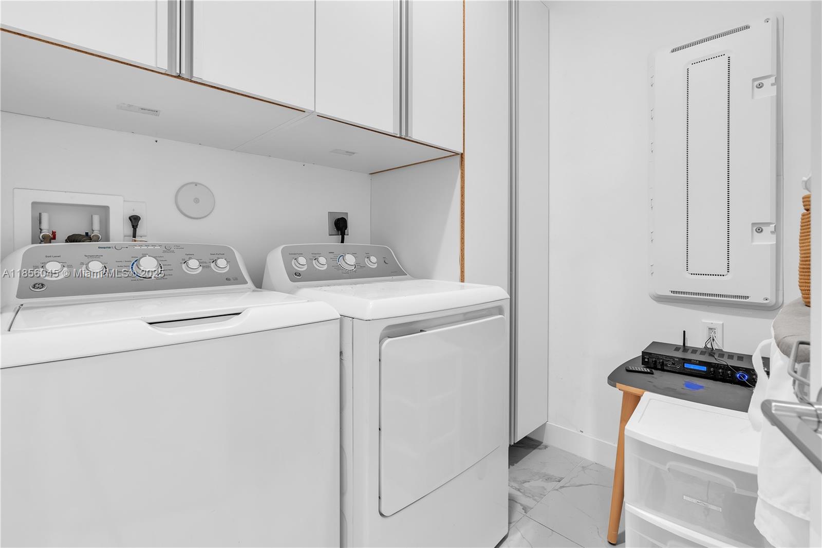 4335 Southwest 173rd Avenue Miramar, FL 33029 - Photo 34 of 59 a utility room with dryer and washer