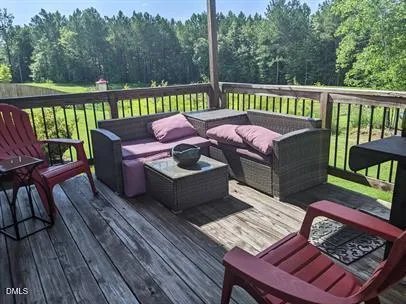 a view of a two chairs in the deck