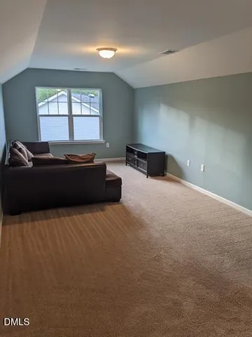 a room with furniture and windows