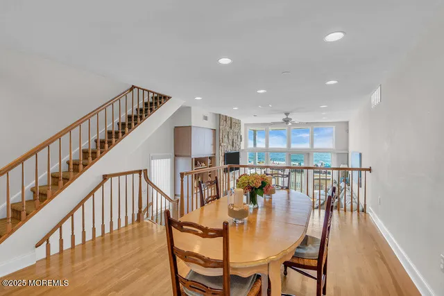 a kitchen with granite countertop a sink stainless steel appliances and cabinets