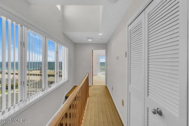 a view of a terrace with wooden benches