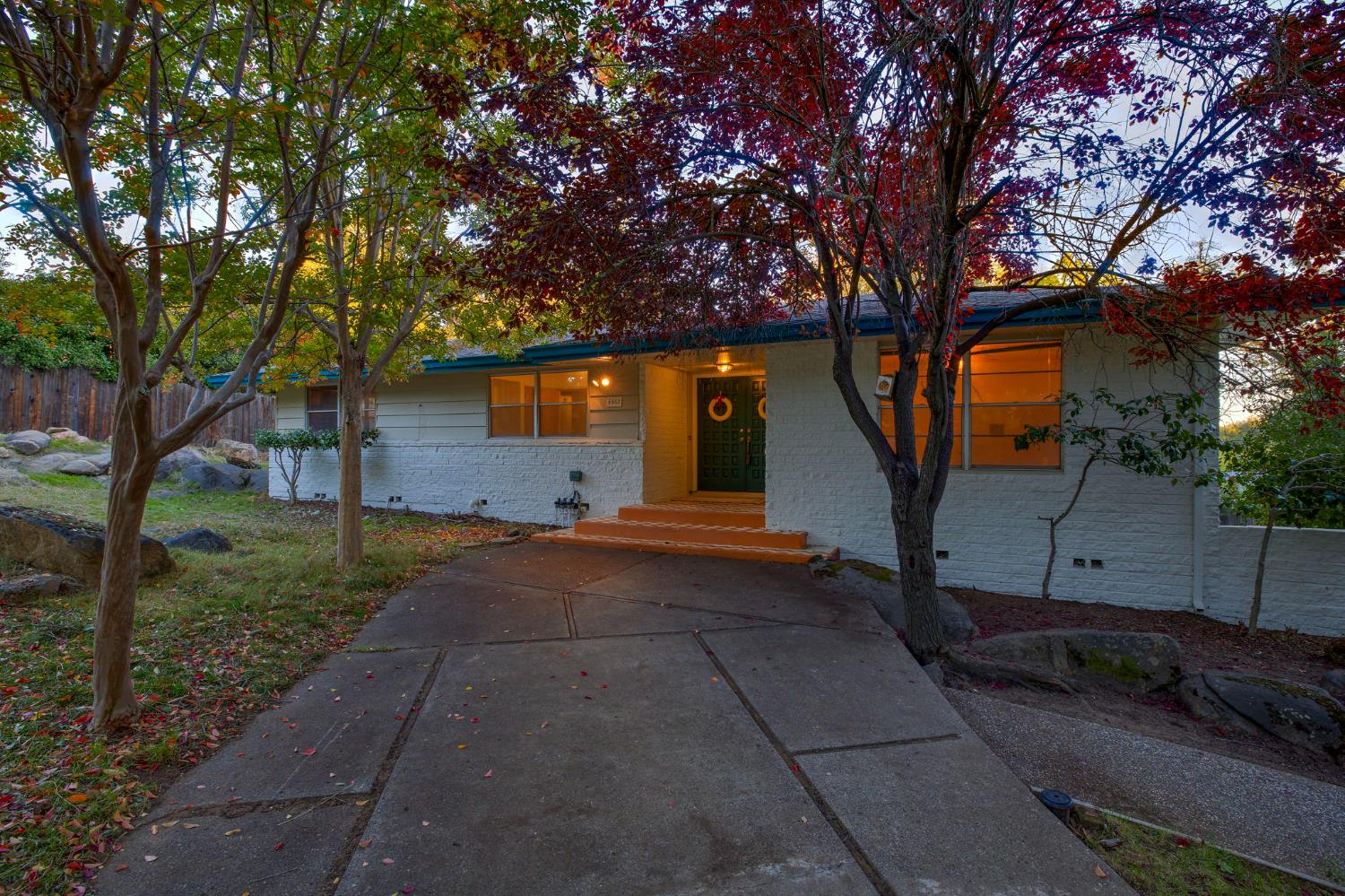 6867 Highland Road Granite Bay, CA 95746 - Photo 1 of 1 a backyard of a house with lots of green space