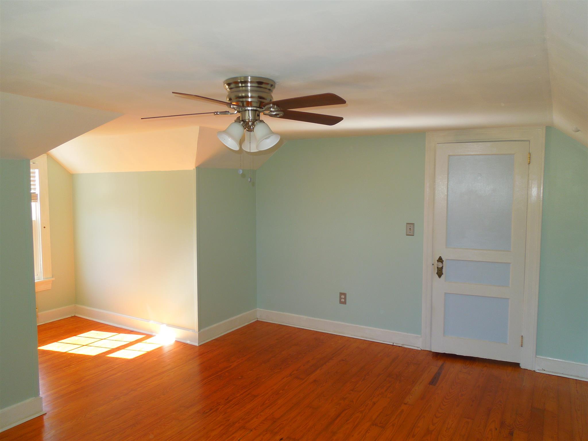 336 Pulaski Street Lawrenceburg, TN 38464 - Photo 13 of 20 a view of empty room with wooden floor