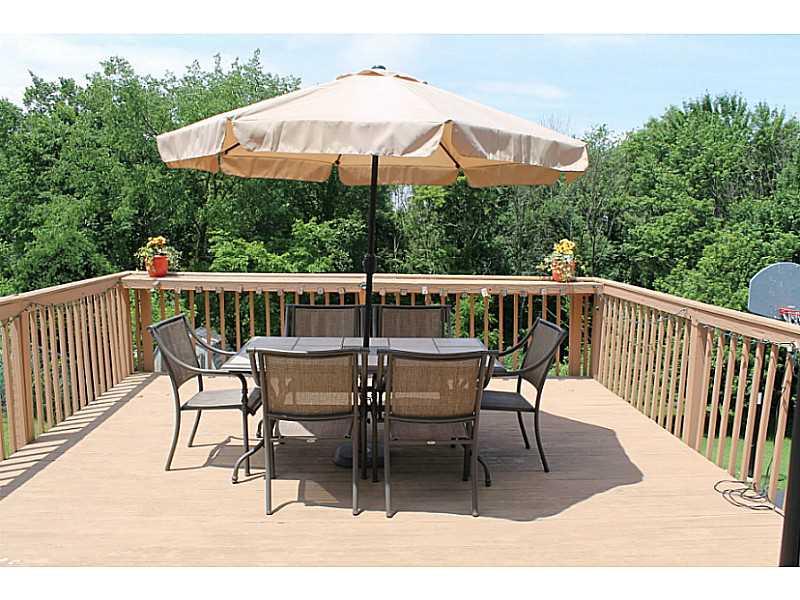 109 Phillips Lane McKees Rocks, PA 15136 - Photo 22 of 25 Patio/Deck. Deck overlooks back yard and woods.