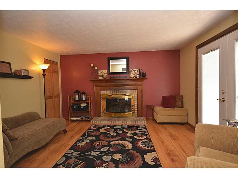 109 Phillips Lane McKees Rocks, PA 15136 - Photo 10 of 25 Family Room. Family room features wood burning fireplace and closet for more storage.