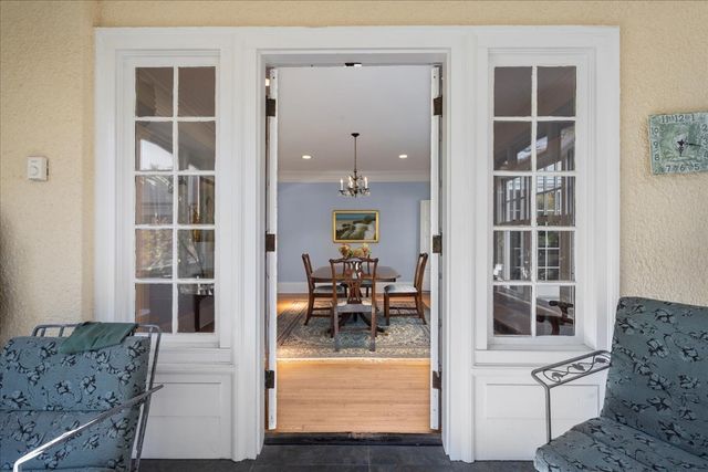a view of living room with furniture and window