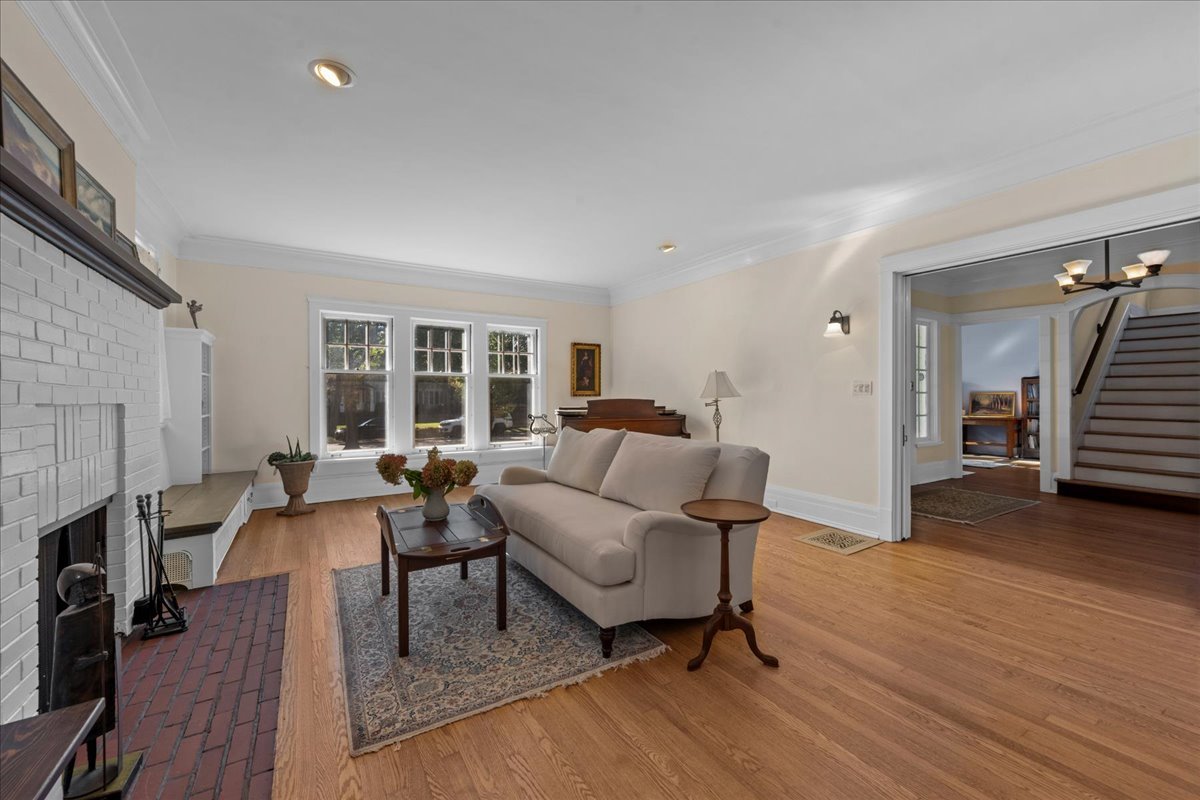 611 Ash Street Winnetka, IL 60093 - Photo 19 of 43 a living room with furniture and a fireplace
