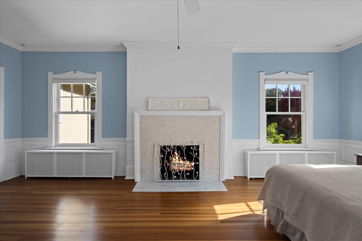 611 Ash Street Winnetka, IL 60093 - Photo 27 of 43 a living room with furniture and a fireplace