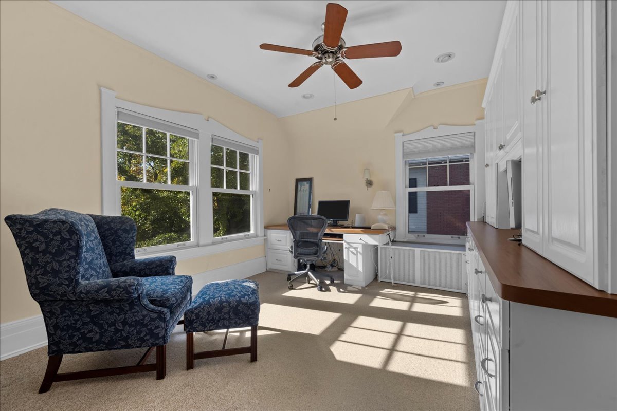 611 Ash Street Winnetka, IL 60093 - Photo 32 of 43 a living room with furniture and a window