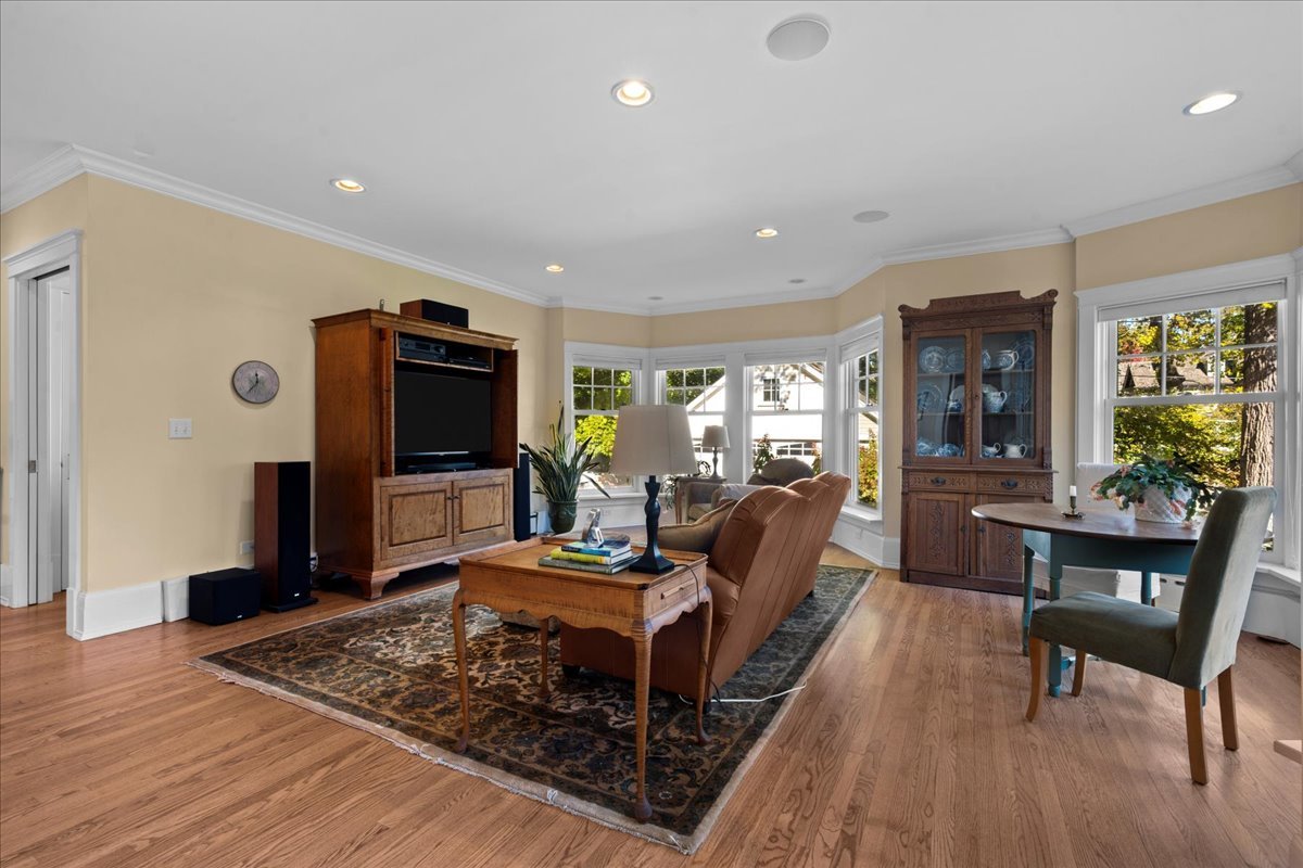611 Ash Street Winnetka, IL 60093 - Photo 9 of 43 a living room with furniture and a flat screen tv